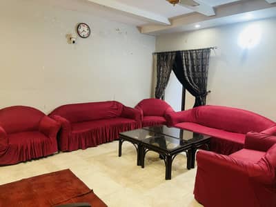 Used sofa set  ( with maroon and black sofa covers)