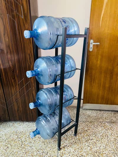 Urgent Sale – 5 Water Bottles + Metal Stand