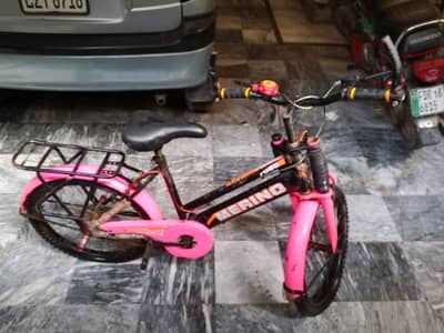 Pink bicycle for age 5 to 10 for sale