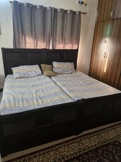 2 single bed only without matress,used but good condition