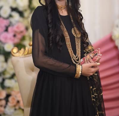 Black full-length maxi with golden work