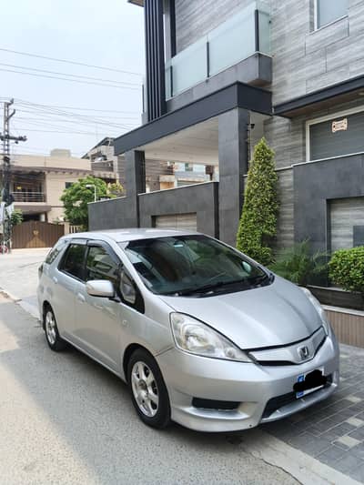 HONDA FIT SHUTTLE.