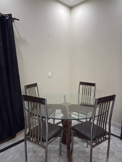 Round dining table with 5 chairs