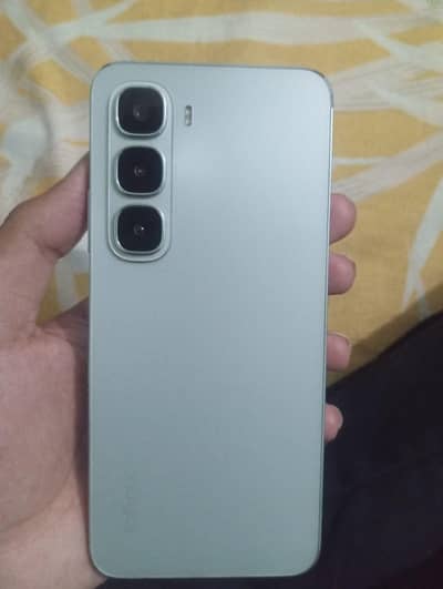Infinix Hot 60i  6 + 6  128GB. with box and charger.