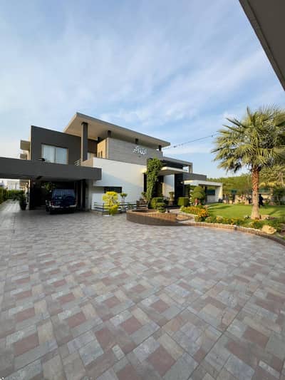 SYED BROTHERS PROUDLY OFFERS: 4 KANAL MODERN DESIGN ( 3-KANAL HOUSE AND 1 KANAL LAWN ) ELEGANT AND FULLY FURNISHED BUNGALOW IS AVAILABLE IN THE BEST BLOCK OF DHA LAHORE.