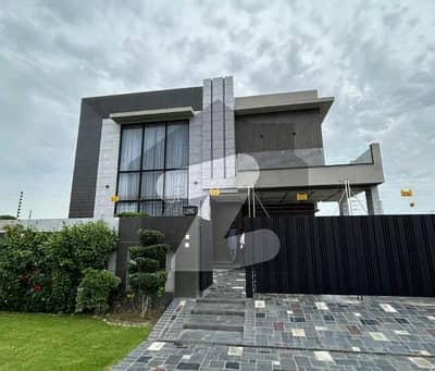 MODERN DESIGN 1-KANAL ELEGANT AND FULLY LOADED SUPER HOT LOCATED BUNGALOW IS AVAILABLE IN THE BEST BLOCK OF DHA LAHORE.