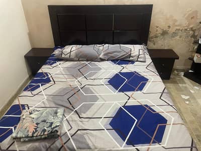 Wooden bed for sell.