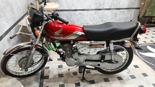 Honda 125 silver addition