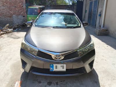 Toyota Corolla GLI Automatic 2015 | Gun Metallic | Total Genuine