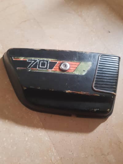 Honda C70 82 side cover