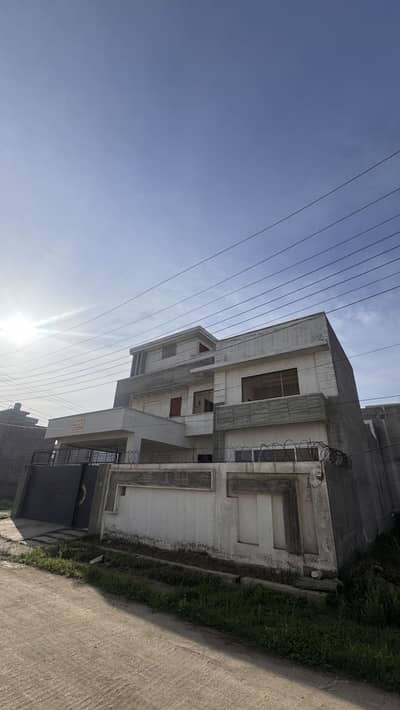 A grey structure house for sale