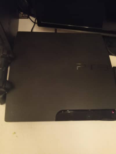 ps3 for sale with 2 controllers 20 games
