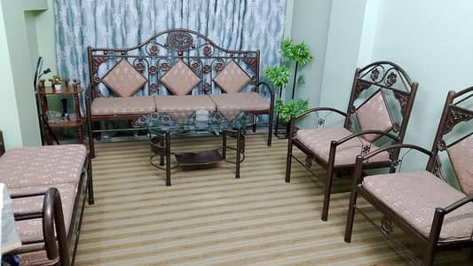 sofa with table and seaty
