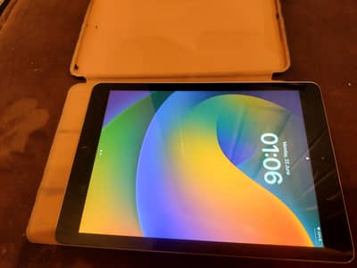 iPad air 5th gen, 32 gb, with a smart cover for free.