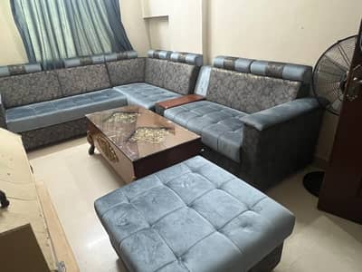 brand new comfortable sofas with new table in rich dark brown colour