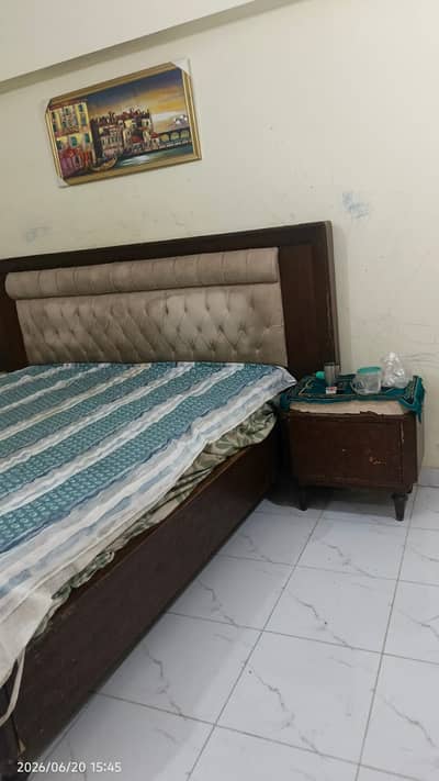 Queen size bed with side table and spring materess good condition