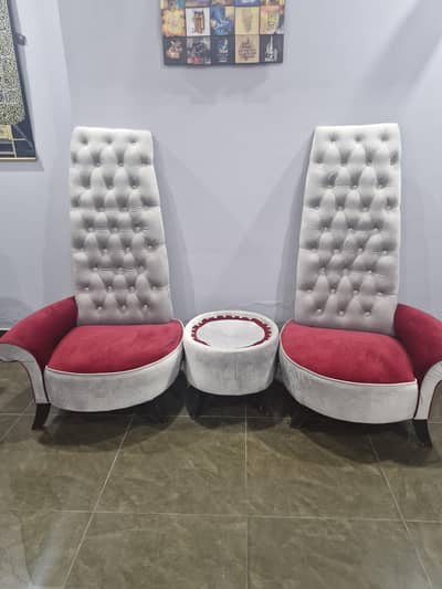 Two single sofa chairs with Table