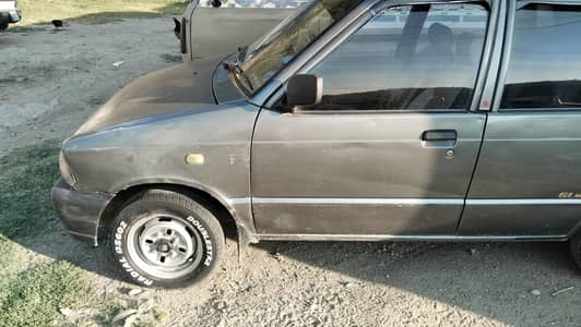 Suzuki Mehran VXR 2010 bonut roof diggi genuine ha 2no side shawar ha
