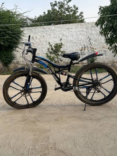 BMX Bike with gears, disk brakes, shock absorber and alloy rims