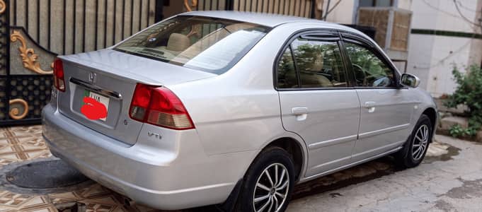 Honda Civic EXi 2005 Vogue Silver Metallic Color