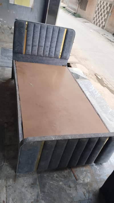 wooden single bed