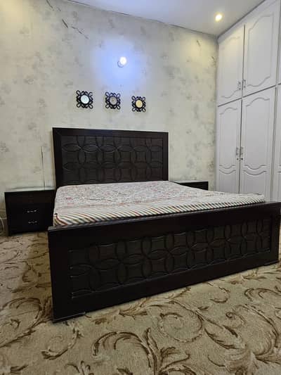 King size bed with a big bottom cabin and single trundle bed