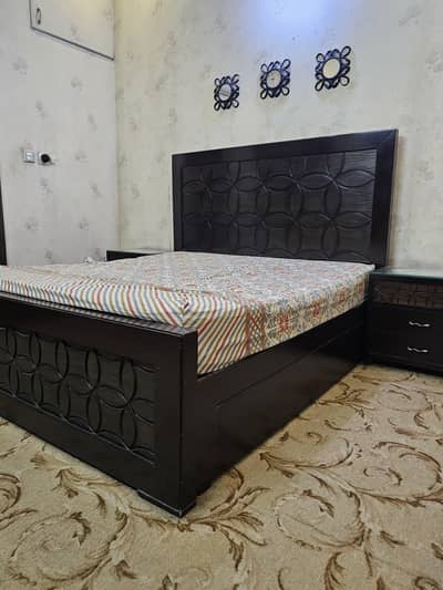 King size bed with a big bottom cabin and single trundle bed