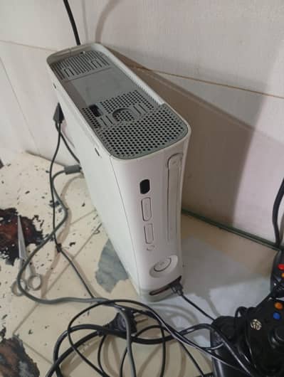 Xbox 360 with 69 games with two controllers