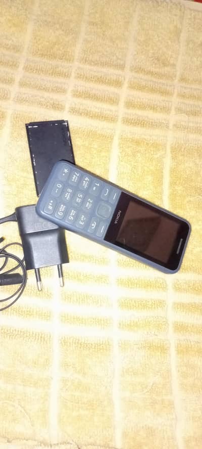 Nokia 125,original,sath original charger,100% all ok. 03196263273