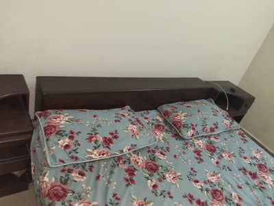 double bed with side table