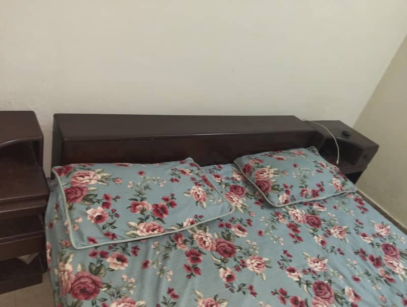 double bed with side table 0