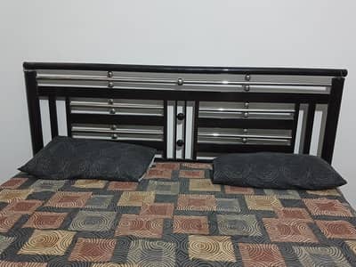 used iron double bed for sale with mettress. . . GOOD CONDITION