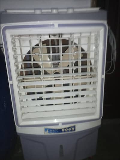 Medium size Air cooler almost new WhatsApp 0318.4095. 043.