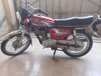 HONDA 125 RED COLOUR