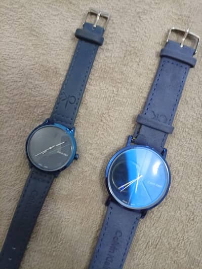 2 wrist watch 1 men's watch 1 women's watch