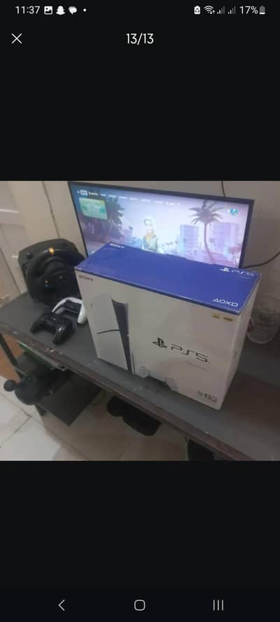 PS5 SLIM DISC EDITION 1TB two controllers,monitor,driving sim.
