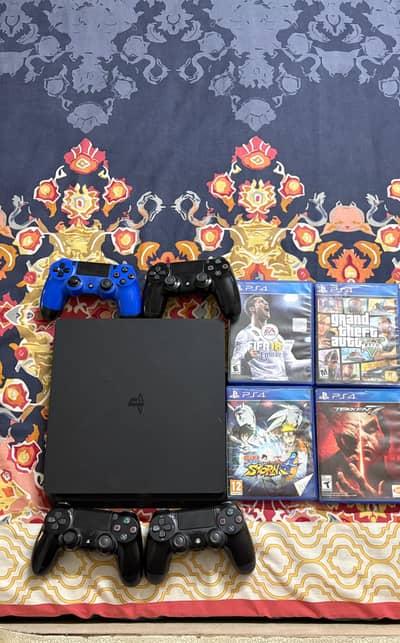Playstation 4 slim [500 gb] with 4 controllers