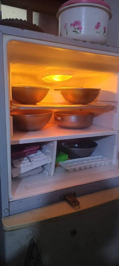 selling my fridge SG 5.3  tall and 2 feet approx width