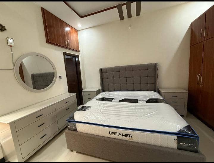 Double Bed with 2 side table and dressing table. . . 1