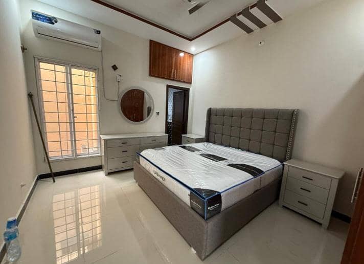 Double Bed with 2 side table and dressing table. . . 2