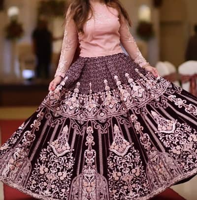 Maroon velvet lehenga choli with heavy embroidery and thread work