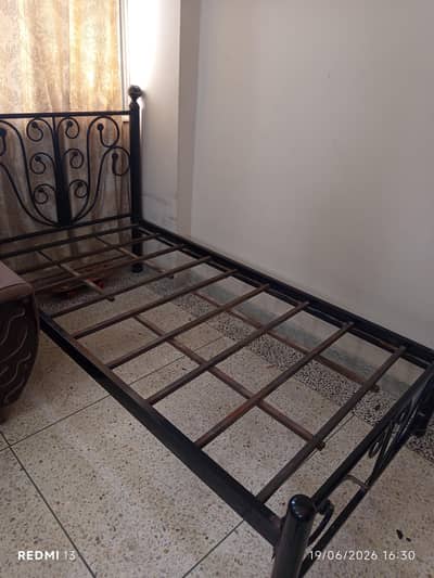 iron bed single. . . . heavy iron. . . . no damage. . .