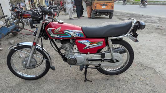 Honda 125 (Total Geniune)