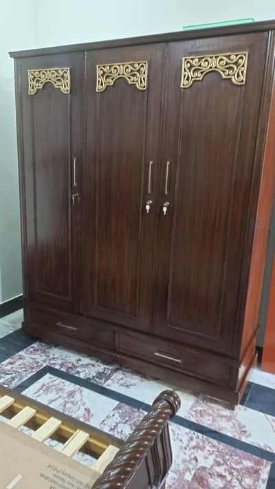 Wooden wardrobe and dressing table