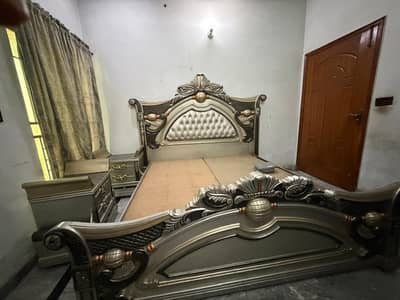 king size bed with 2 side Tables and one Dressing