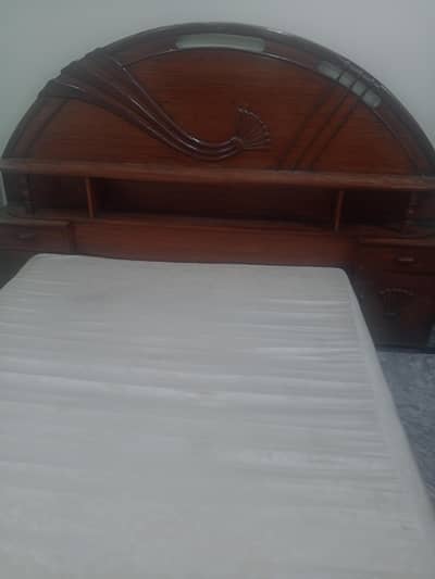 bed with mattress dressing