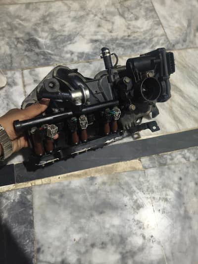 Mira injector with butter fly