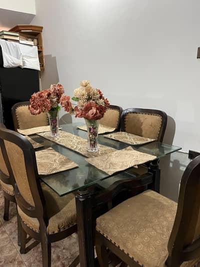 6 seater dining table in brown colour