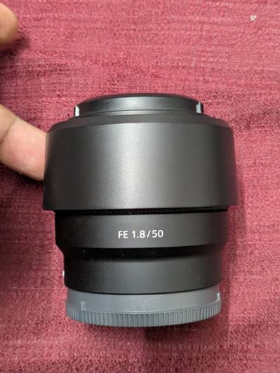 Sony 50mm 1.8 with box + hood