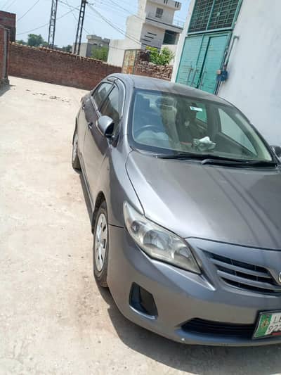 Toyota Corolla GLI 2010 l Janine lady side for pante